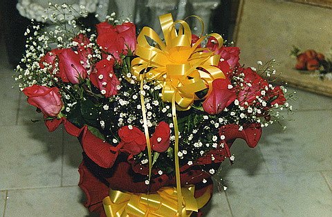 Clásico arreglo de rosas de Natural...